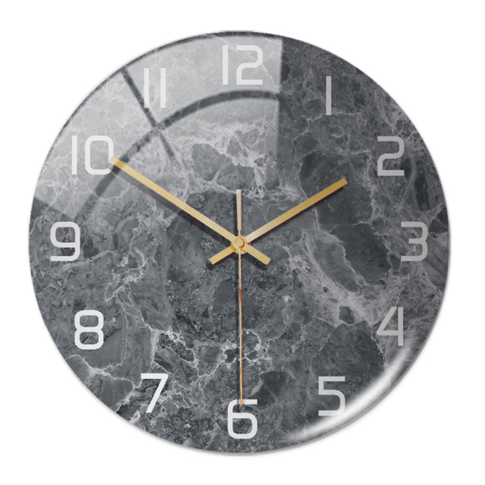 Stylish marble-style wall clock for modern home interiors, a quiet decorative clock.