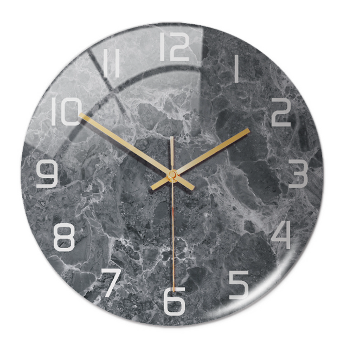Stylish marble-style wall clock for modern home interiors, a quiet decorative clock.