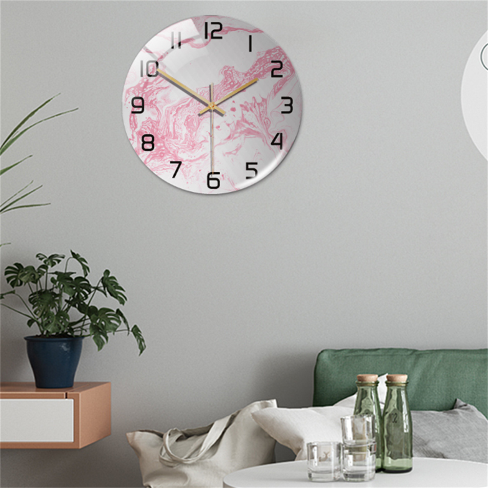 Elegant marble-effect wall clock, perfect for adding a modern touch to home decor.