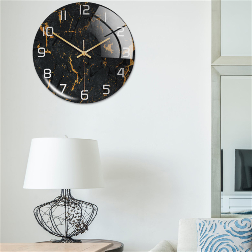 Luxury marble-style wall clock, a modern timepiece for upscale living room decor.