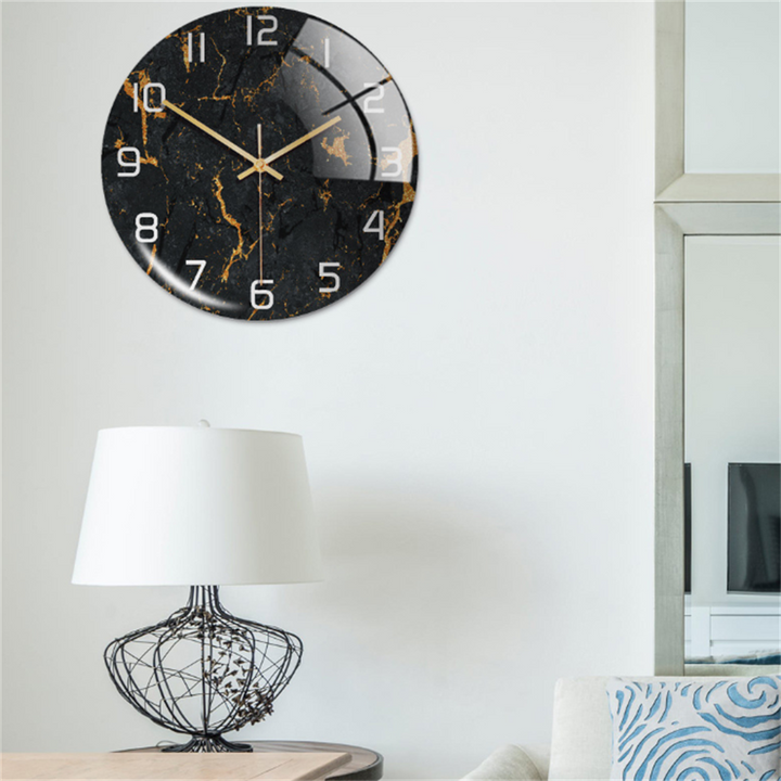 Luxury marble-style wall clock, a modern timepiece for upscale living room decor.