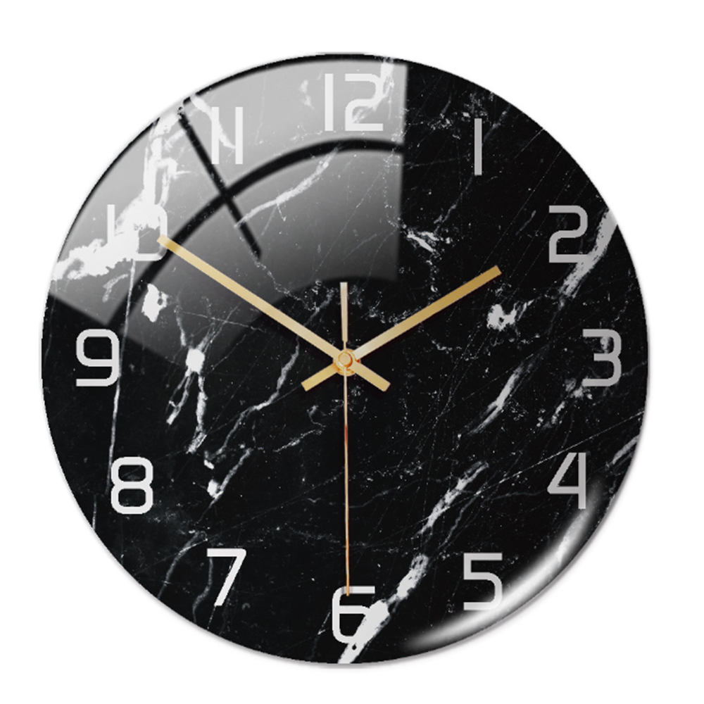 Round wall clock with a luxurious marble pattern, perfect for modern and elegant spaces.