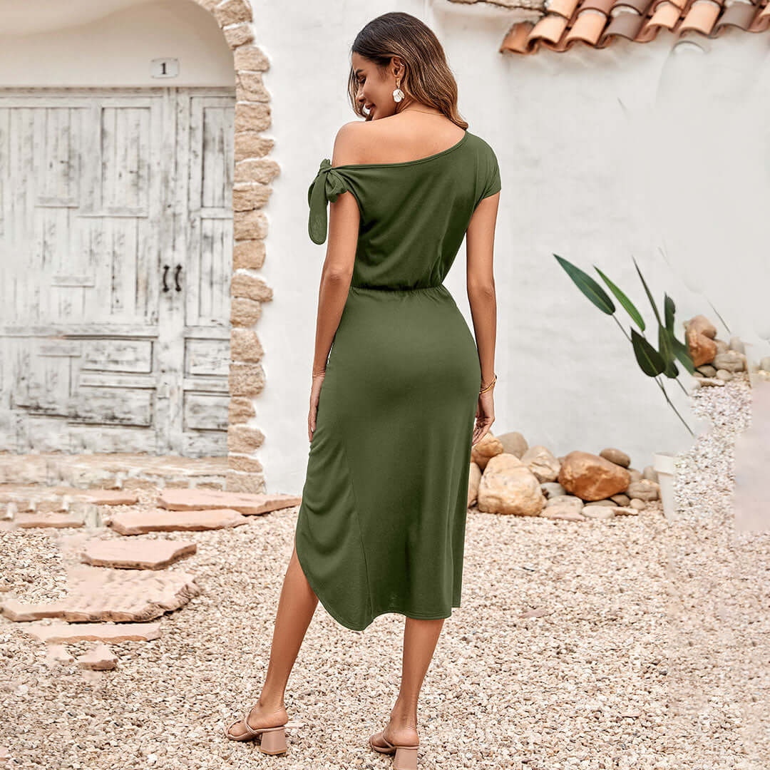 Front view of elegant women's off-shoulder ruched midi dress. Figure-flattering for parties.
