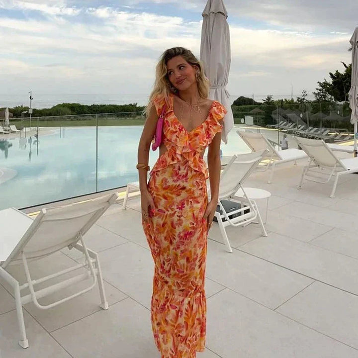 Elegant orange ruffled maxi dress for women with stylish batwing sleeves, perfect for evening wear or formal occasions.