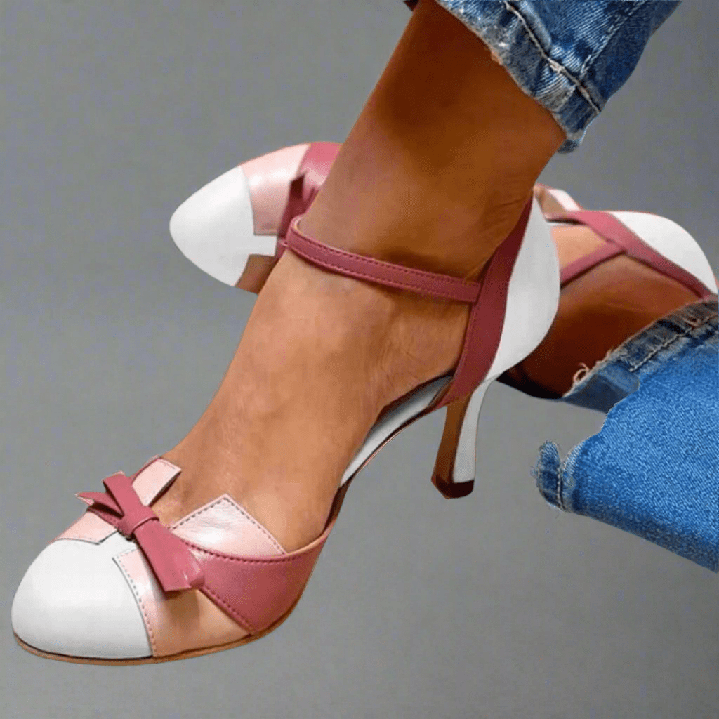 Cushioned vegan leather heeled sandals for women, featuring an elegant bow, offering orthopedic comfort.