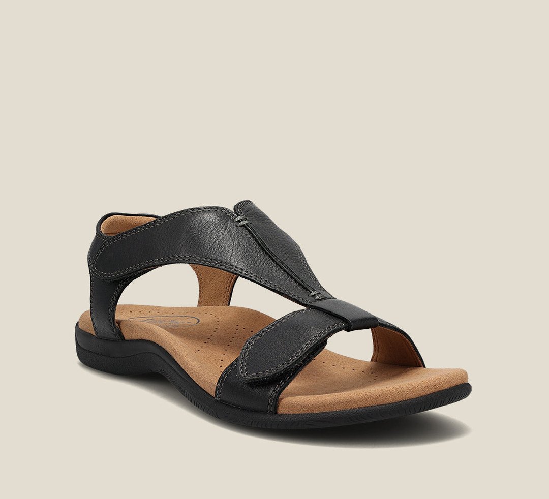 Woman wearing elegant orthopedic summer sandals, perfect for daily wear & foot health.