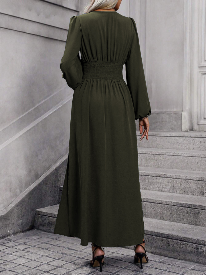 Stunning pink long sleeve midi slit dress. Elegant women's party wear, perfect as a wedding guest or cocktail dress.