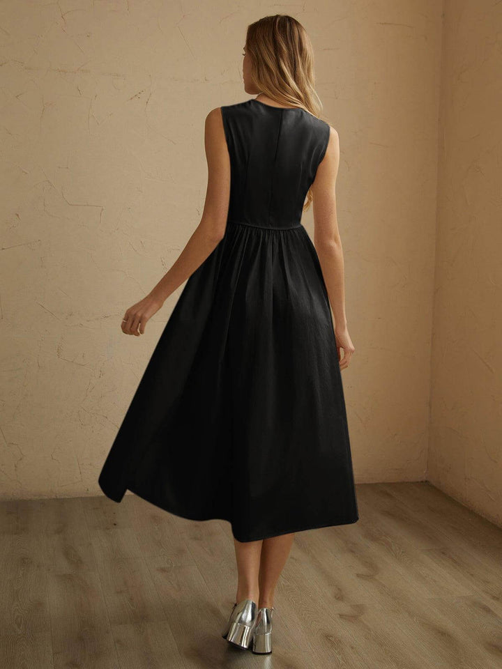 Chic women's off-white pleated midi dress, elegant & flowing, ideal for comfortable summer style.