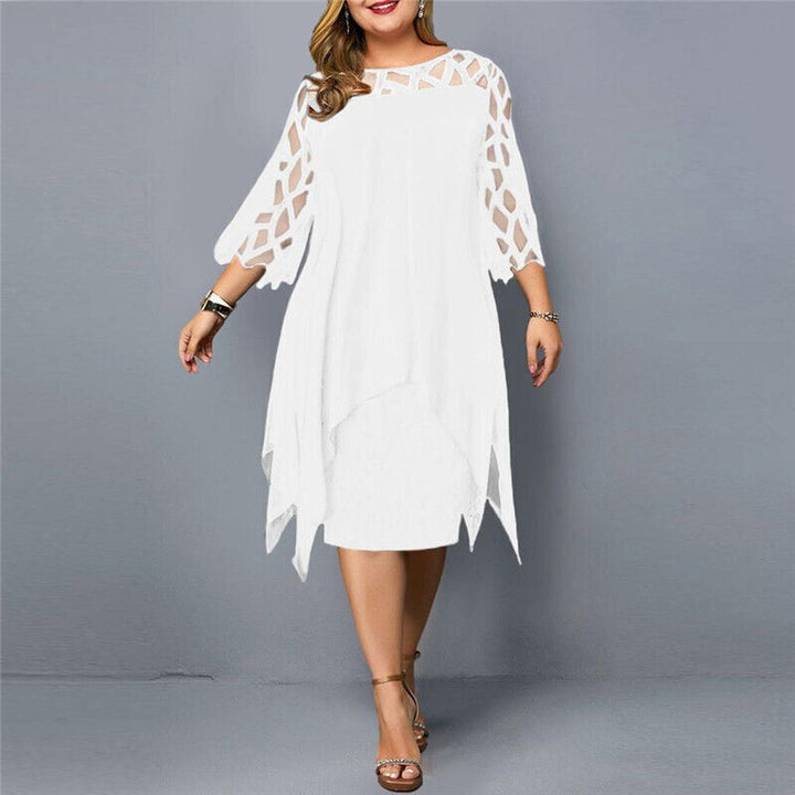 Accessorized women's plus size midi dress. Elegant long sleeve design for evening & cocktail events.