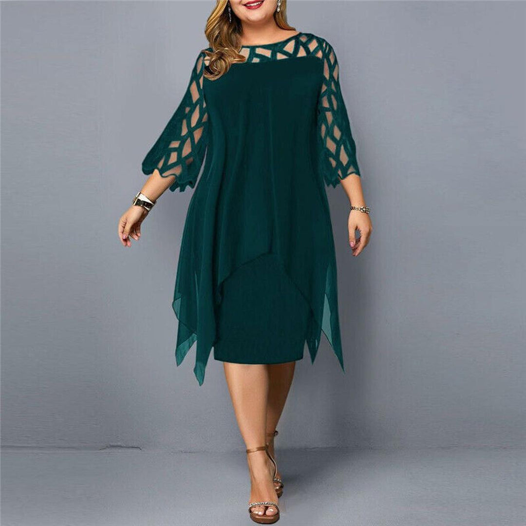 Model posing in elegant plus size midi dress. Long sleeve cocktail attire for women's evening events.