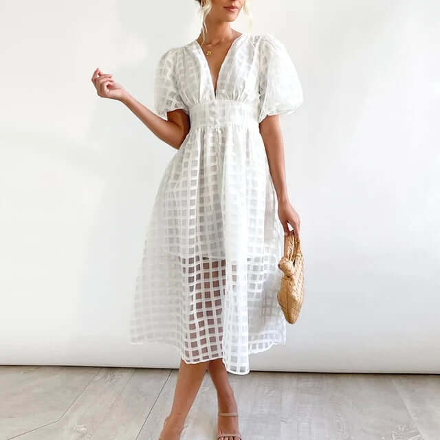Elegant polyester midi dress for women, perfect casual summer day wear.
