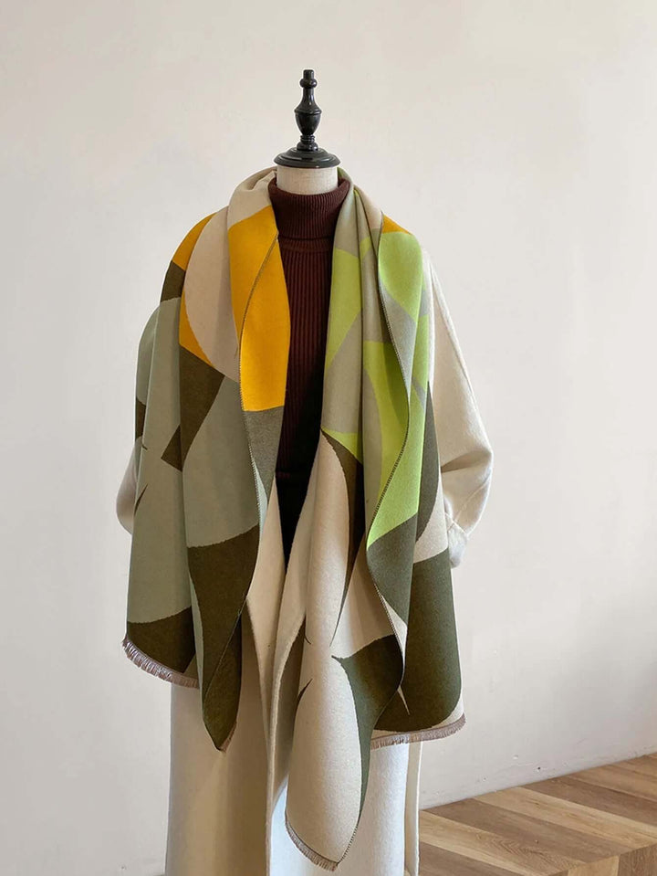 Stylish green reversible elegant women's scarf. Soft, warm winter fashion accessory.