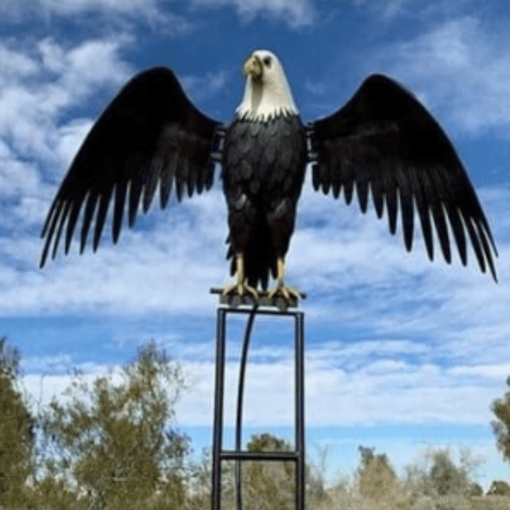 Unique garden decor: rotating windmill sculpture with eagle design, metal art.