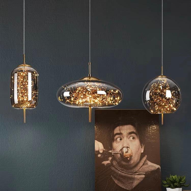 Elegant Scandinavian LED pendant light with sleek glass design; perfect for modern spaces, enhancing ambiance with soft glow.