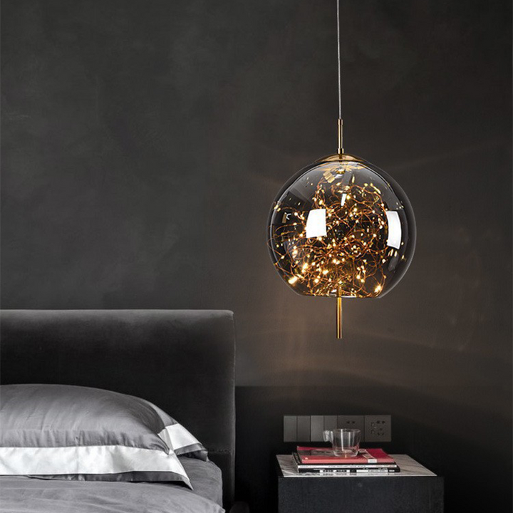 Elegant Scandinavian LED pendant light with sleek glass design; perfect for modern spaces, enhancing ambiance with soft glow.