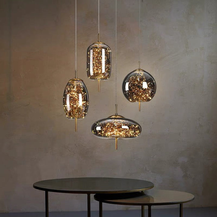 Elegant Scandinavian LED pendant light with sleek glass design; perfect for modern spaces, enhancing ambiance with soft glow.