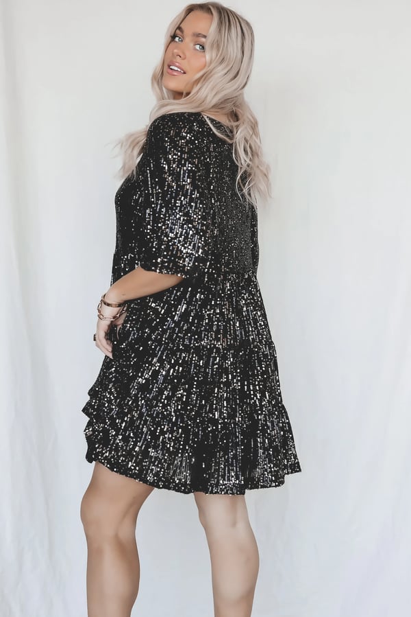 Women's elegant sequined A-line dress. ShimmerFlow glitter short party dress for special occasions.