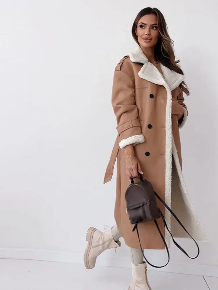 Sophisticated Seraphina ladies long winter coat. Stylish, warm, and chic for cold weather fashion.