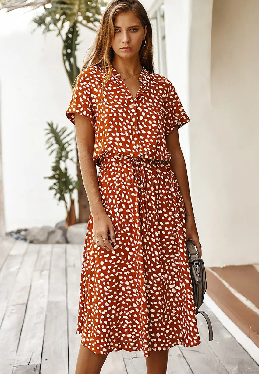 Women's short-sleeve midi dress, featuring an elegant design for versatile spring, summer, and fall fashion.