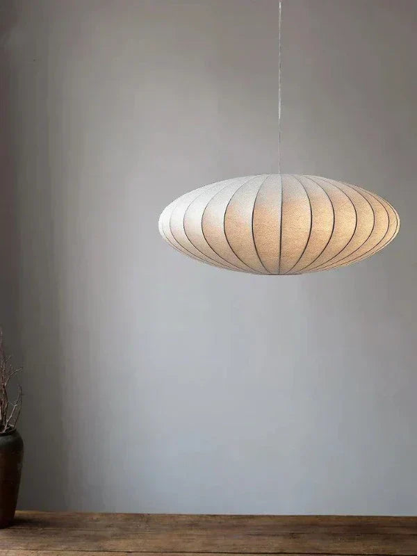 Elegant silk & crystal pendant light, perfect modern luxury lighting for living rooms, dining areas, or bedrooms.
