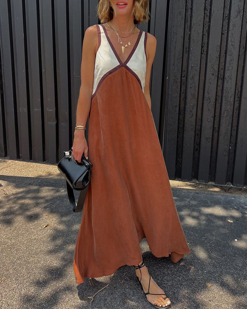 Modern elegant V-neck maxi dress for women, featuring a chic contrast design. Long and stylish.