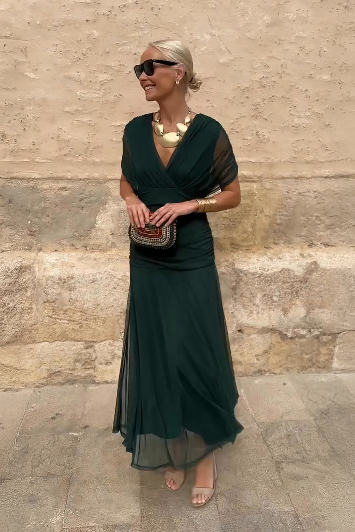 Elegant V-neck fantasy print maxi dress for women, perfect for parties & special occasions.