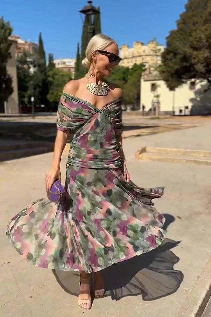 Elegant women's party maxi dress featuring a chic V-neck and stunning fantasy print for sophisticated style.