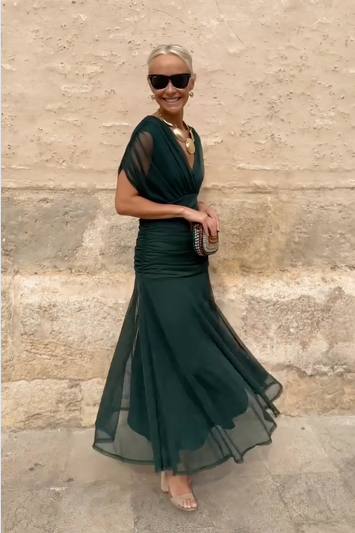 Sleeveless V-neck maxi dress for women, elegant fantasy print, ideal for summer parties & events.
