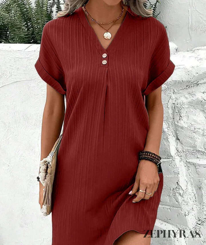 Chic women's V-neck midi dress, ideal for summer, casual outings, or elegant party wear. Comfortable and fashionable.