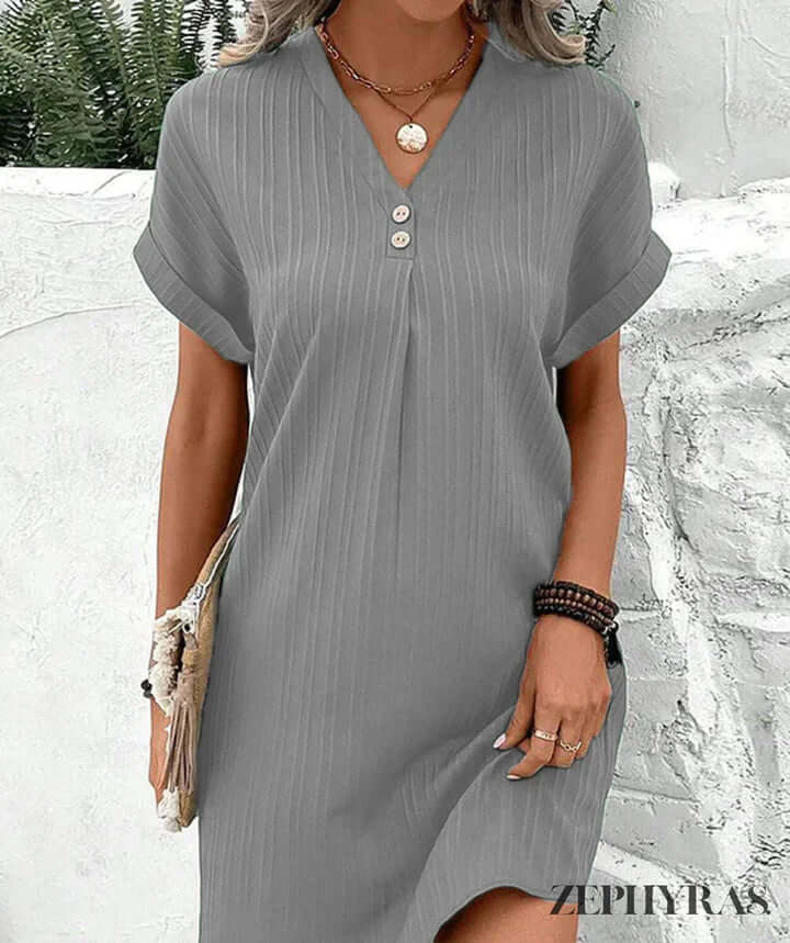 Beautiful women's elegant V-neck midi dress, suitable for all occasions. Summer, party, or everyday fashion.