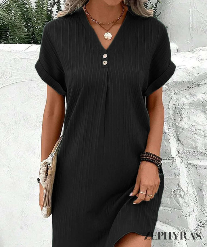 Versatile women's midi dress with a flattering V-neck, perfect for elegant casual or party looks. Polyester blend.