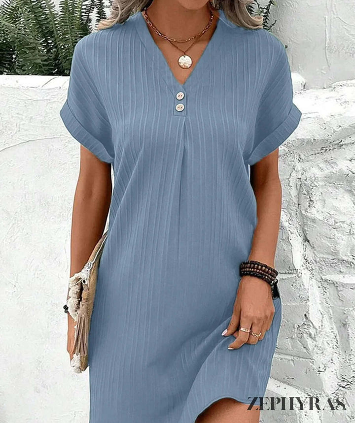 Fashionable women's V-neck midi dress, an elegant summer dress designed for comfort and style. All occasions.