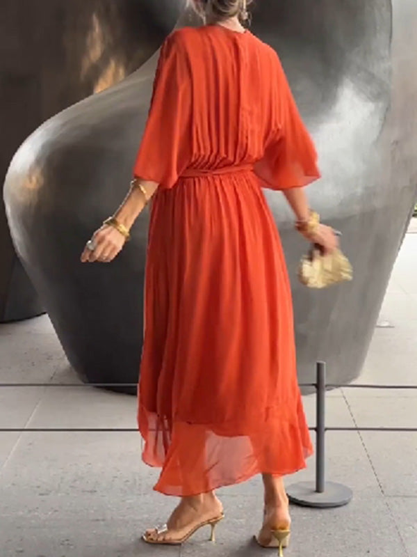 Chic A-line maxi dress featuring a V-neck and short sleeves for evening events.