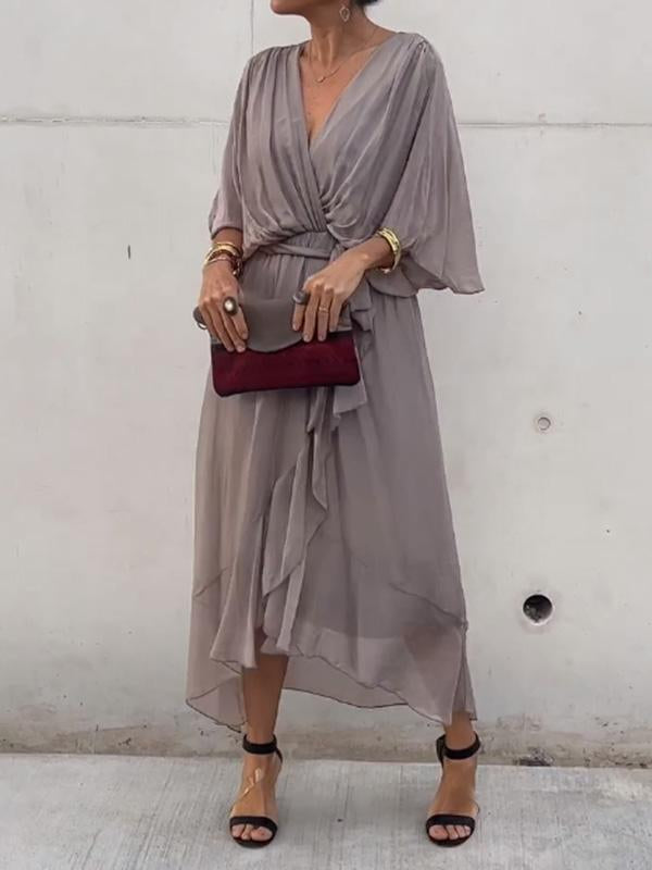 Beautiful blue V-neck short sleeve maxi dress, a sophisticated choice for evening wear.