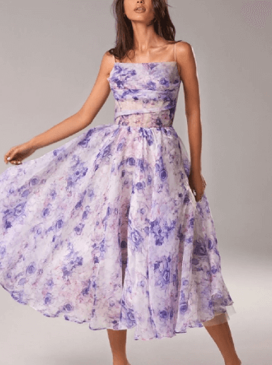Elegant V-neck summer midi dress for women, flowy sleeveless design, perfect for casual or party.