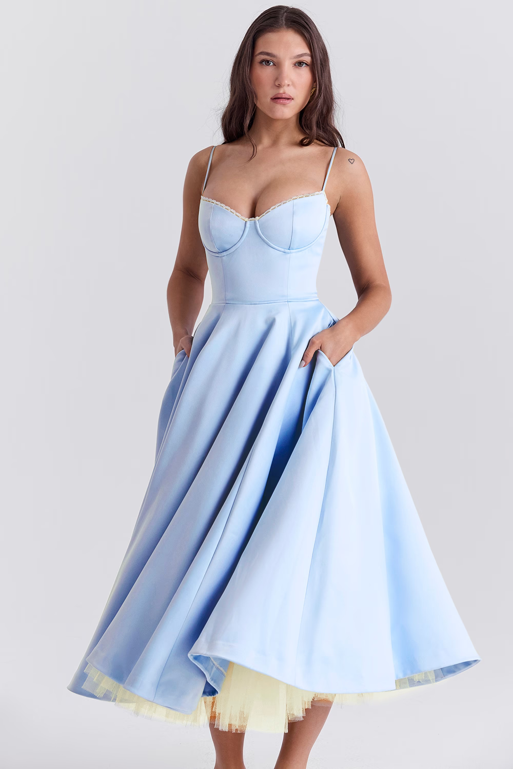 Elegant vintage midi dress with a flowing skirt, perfect for special occasions.