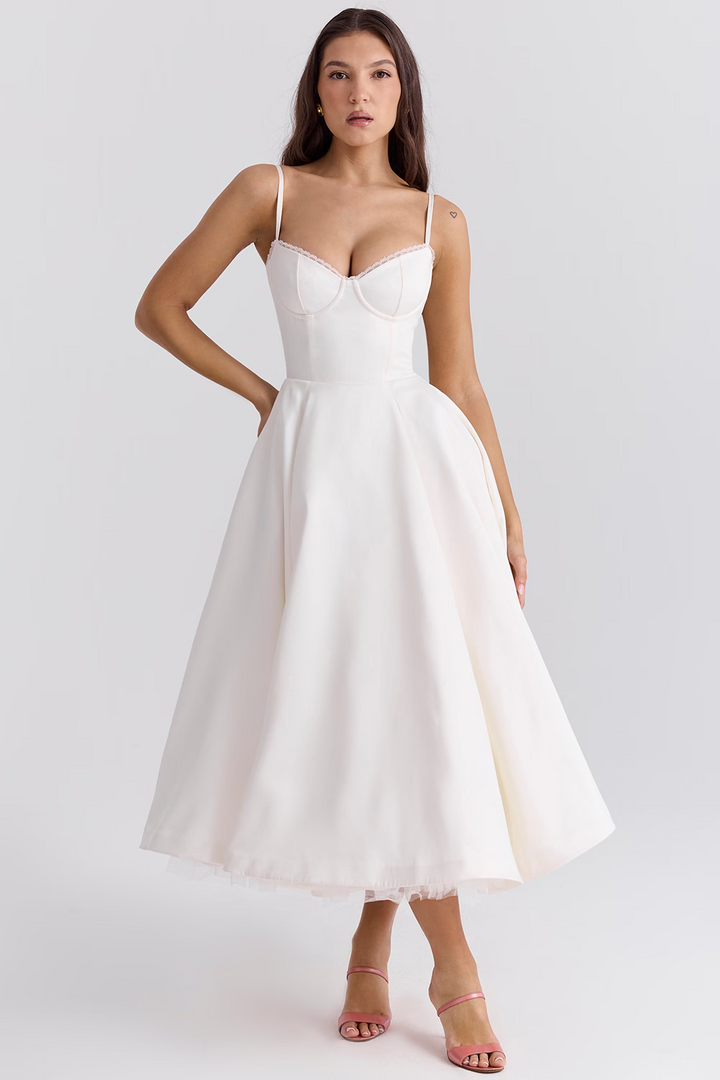 Timeless vintage midi dress with a flowing skirt and delicate lace trim for women.