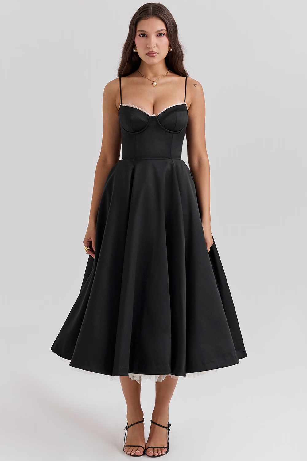 Elegant women's vintage dress, a midi length with a classic retro silhouette.