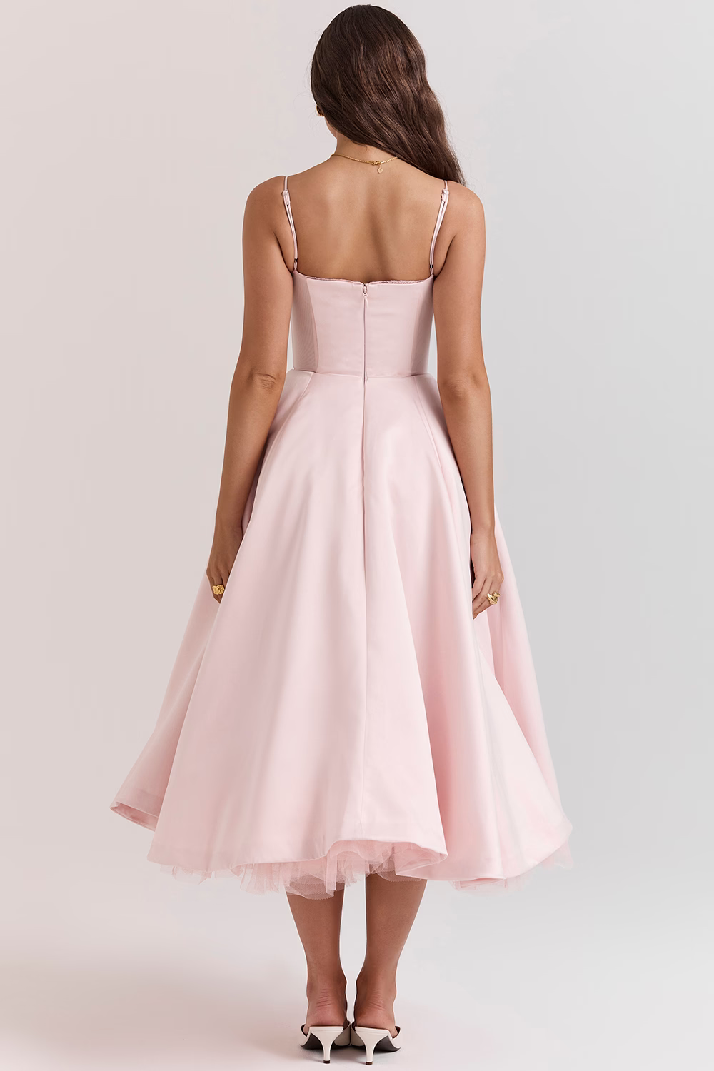 Beautiful women's midi dress with a flowing skirt, showcasing vintage elegance.