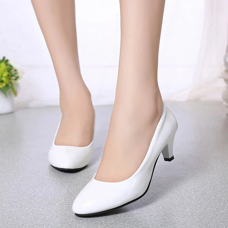 Elegant white classic pump heels for women with pointed toe, perfect for work, weddings, or formal events.