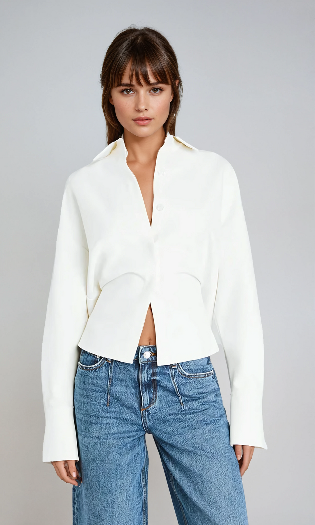 Elegant white draped button-down shirt for women. Versatile, smart-casual workwear top with chic style.