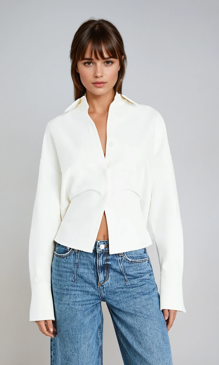 Elegant white draped button-down shirt for women. Versatile, smart-casual workwear top with chic style.