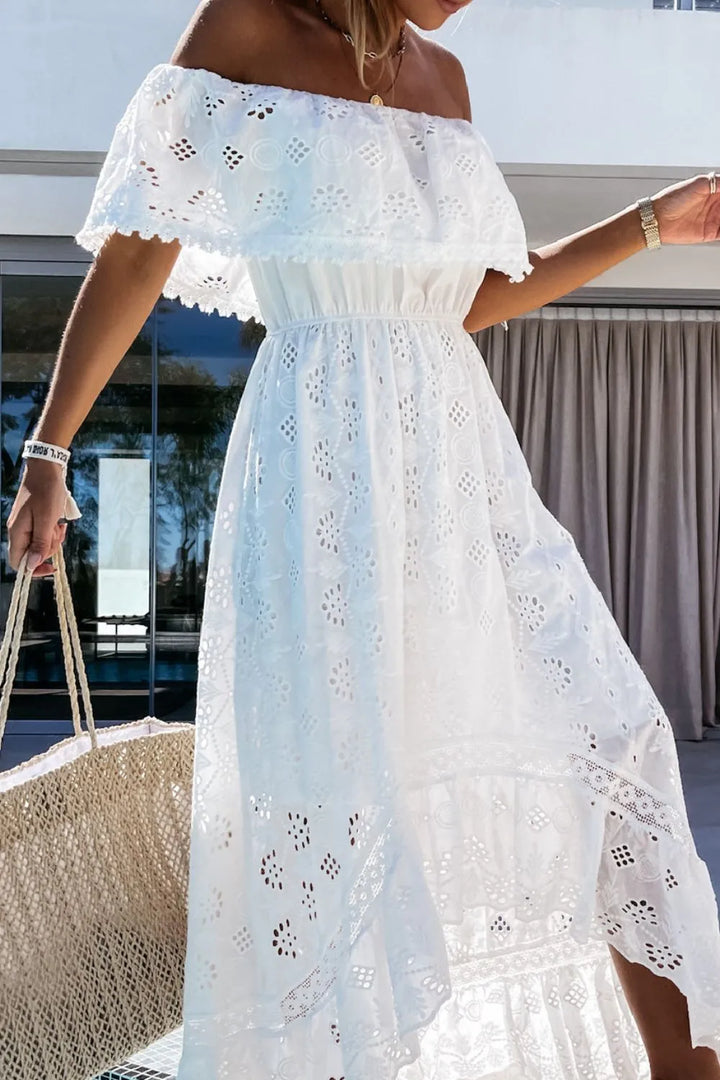 Breathable white off-shoulder high-low summer dress for women, offering style & comfort for party guests.