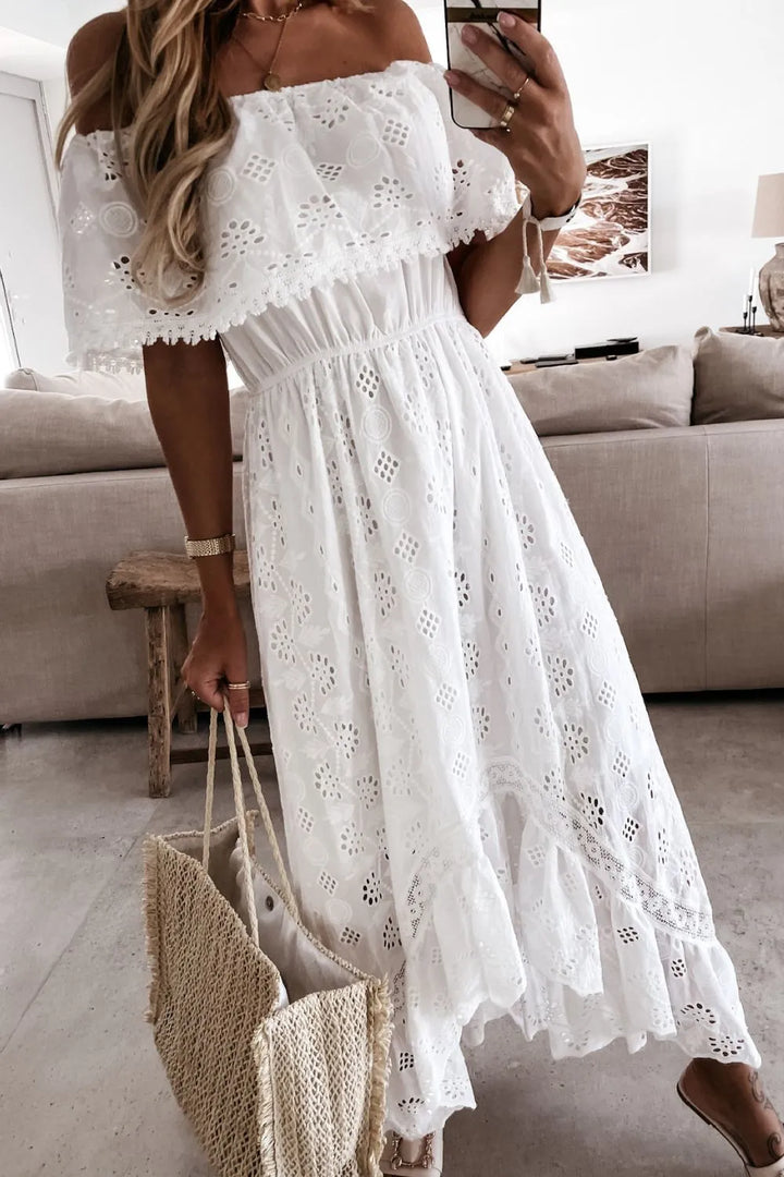 Chic women's white high-low ruffled dress, showcasing an elegant off-shoulder design for summer celebrations.