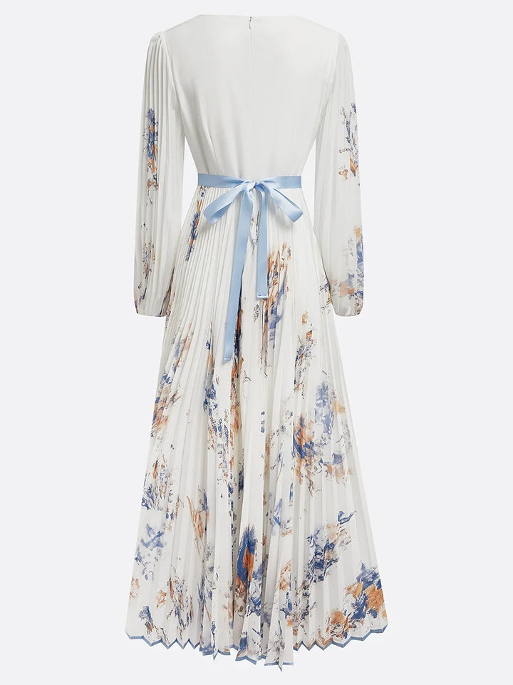 Beautiful women's white V-neck maxi dress with delicate puff sleeves, exuding timeless style and comfort. Perfect for events.