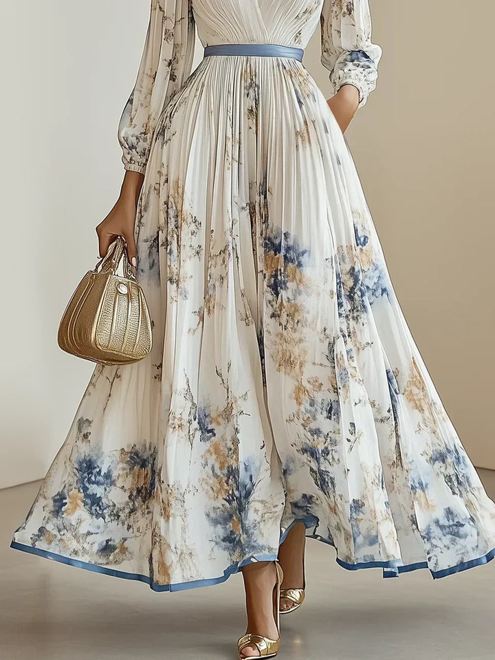 Graceful white elegant maxi dress for women, featuring a flattering V-neck and trendy puff sleeves. Ideal for memorable events.