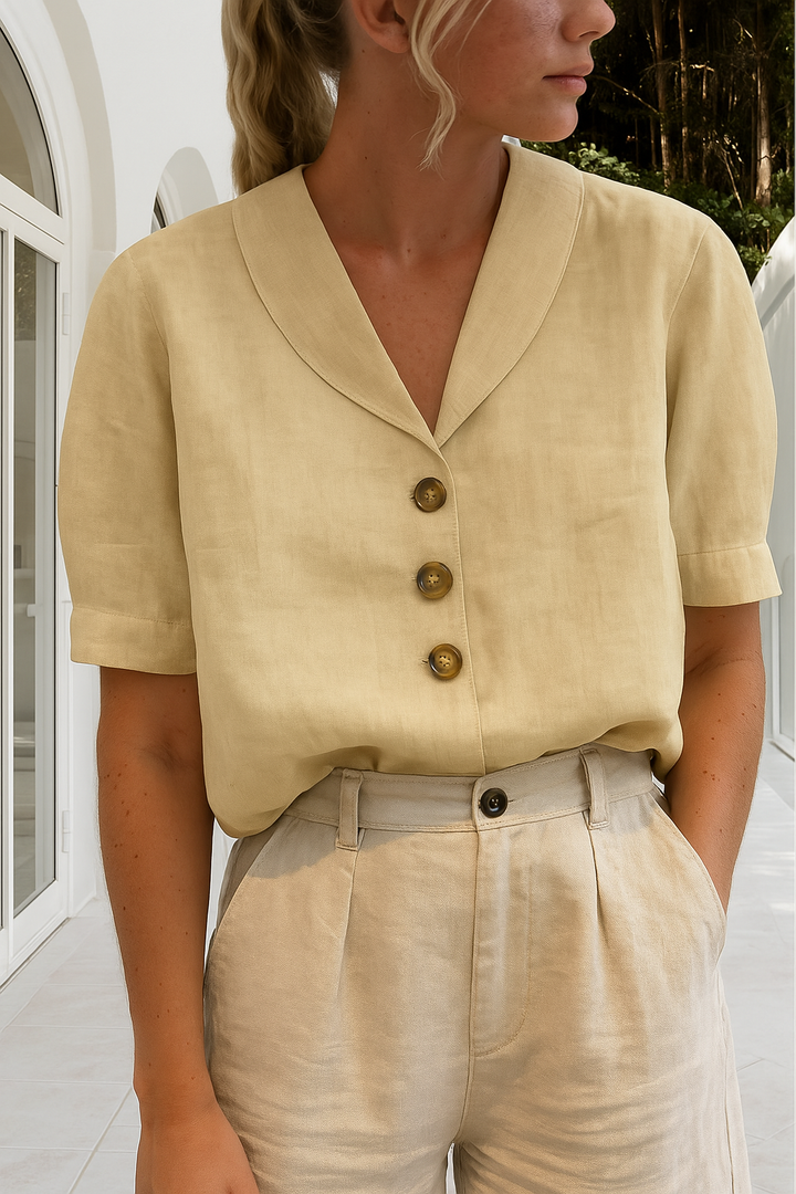 Sophisticated black women's blouse with long sleeves, offering classic style for work or everyday elegance.