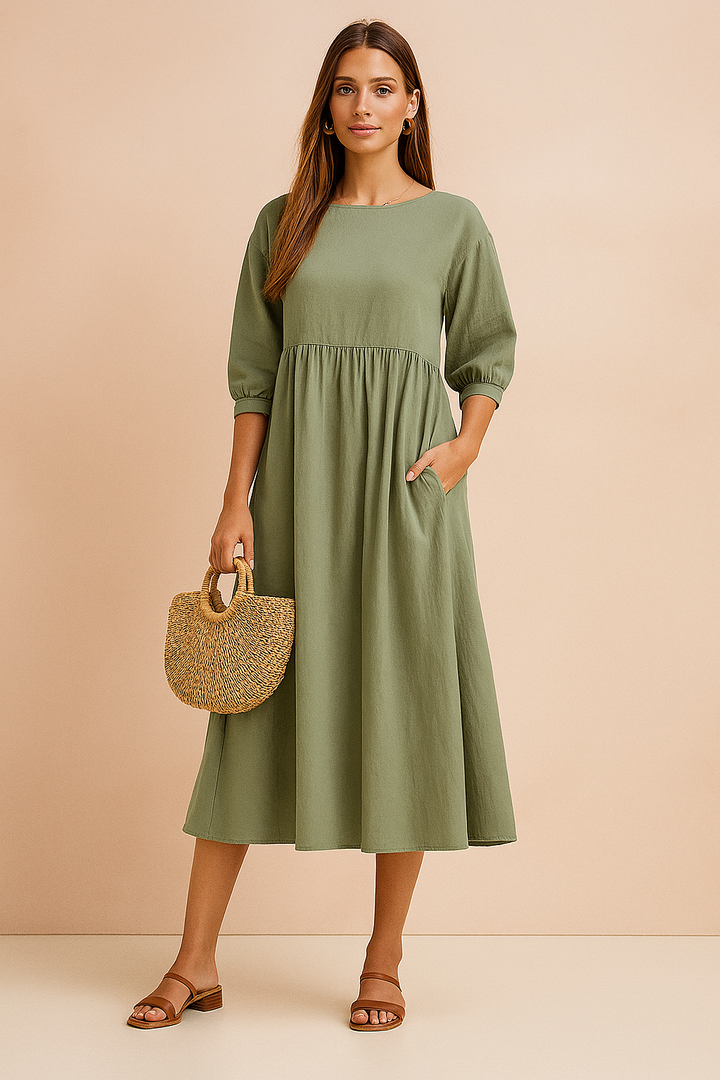 Elegant women's 3/4 sleeve midi dress. Perfect for versatile everyday wear and chic office style.