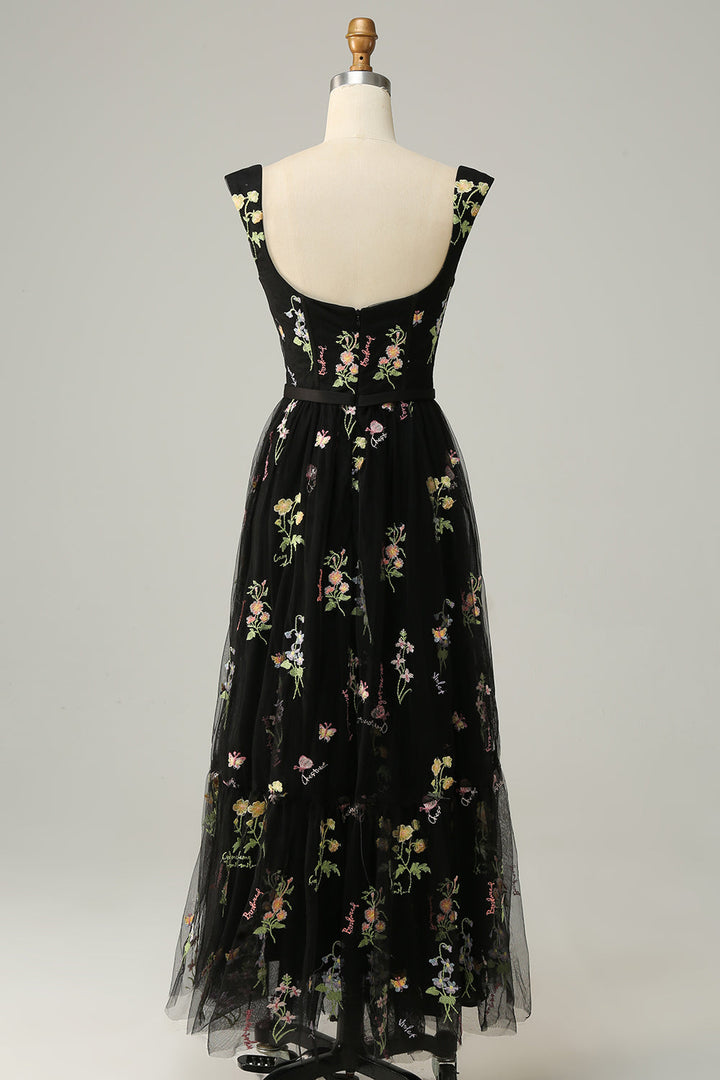 Luxurious long A-Line dress with refined embroidery, designed for discerning wedding guests & galas.