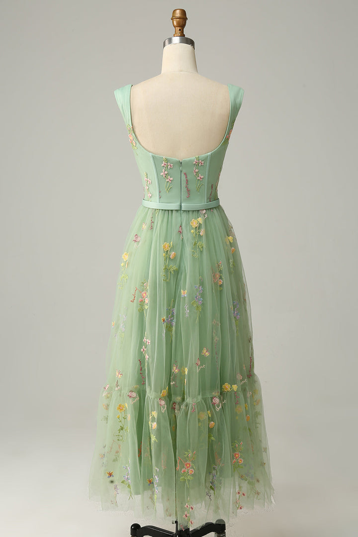 Stunning long A-Line evening dress with intricate embroidery, ideal for weddings & prom.